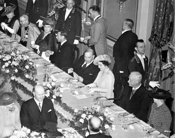 Queen Elizabeth the Queen Mother - King George VI and Queen Elizabeth at the Château Frontenac.  [L-R]: Mme. Patenaude, Cardinal Villeneuve, Mme. Lapointe, King George VI, Rt. Hon. W.L. Mackenzie King