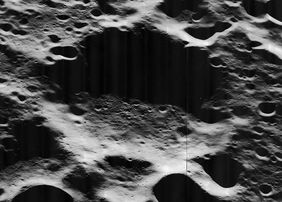 Charles Édouard Guillaume - Oblique view of Guillaume, on the far side of the moon, facing west.