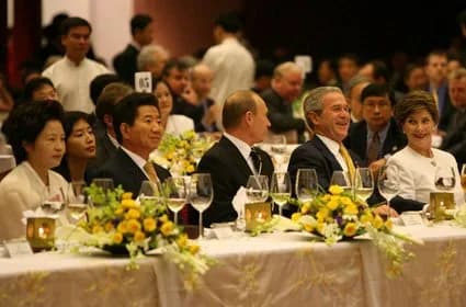 Roh Moo-hyun - President Roh Moo-hyun of South Korea, and his wife Yang-Sook Kwon, at the Gala Dinner and Cultural Performance at the National Convention Center in Hanoi during the 2006 APEC summit Fr
