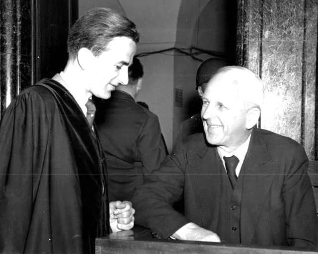 Richard von Weizsäcker - One of the not too serious moments is captured during court recess in the trial of Baron Ernst von Weizsaecker and twenty other former officials of the Nazi government. Here t