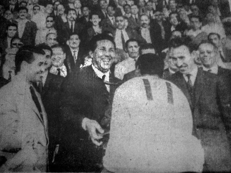 Ahmad ibn Billah - Bentifour, coach of USM Alger teams receives the first algerian championship football trophy (1962-1963) by hand of Ben Bella president of Algeria.