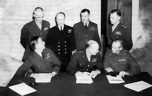 Bernard Montgomery - HIGH-LEVEL CONFERENCE in London. Seated, left to right: Air Chief Marshal Tedder, General Eisenhower, and General Montgomery. Standing: General Bradley, Admiral Ramsay, Air Chief 