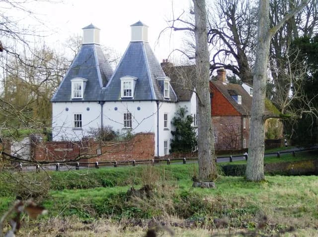 Bernard Montgomery - Isington Mill. Mill on the river Wey which runs under the road in the foreground.  This was the last home of 1st Viscount Montgomery of Alamein, "Monty", until his death in 1976. 