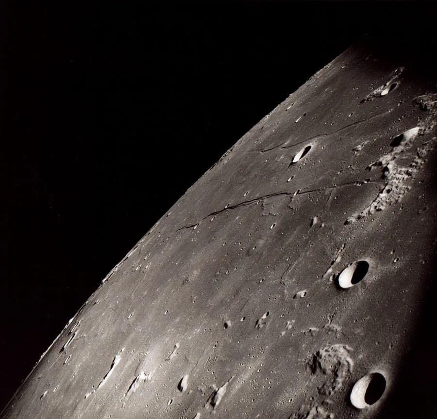 Augustin-Louis Cauchy - This image illustrates the eastern Mare Tranquillitatis looking northward as seen by the crew of the Apollo 8 mission. In the upper right of this picture are a pair of features
