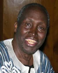 Ngũgĩ wa Thiong'o - Ngũgĩ wa Thiong'o signs copies of his new book Wizard of the Crow at the Congress Centre in central London. Wizard was his first book in 20 years, following 22 years of exile due t