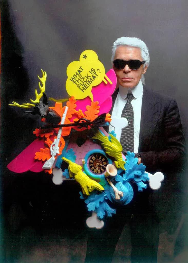 Karl Lagerfeld - KarL Laqgerfeld mit einer Kuckuksuhr von Stefan Strumbel