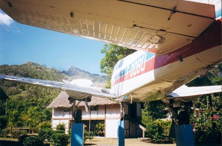 Jacques Brel - In the city of Atuona, Hiva Oa, French Polynesia, the small plane used by Jacques Brel in front of the maison du jouir built by Paul Gauguin