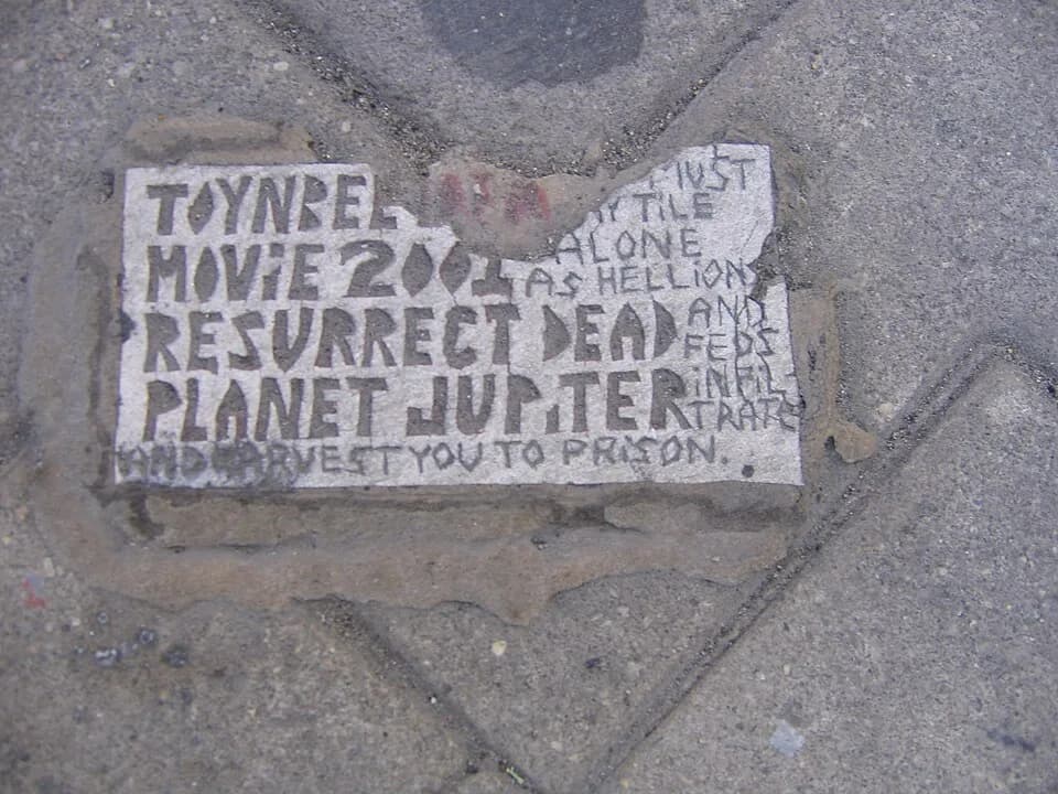 Arnold J. Toynbee - en:Toynbee tile at the intersection of Broad Street and Walnut Street in en:Philadelphia.  Photographed 07-22-2007 by en:User:Spikebrennan
