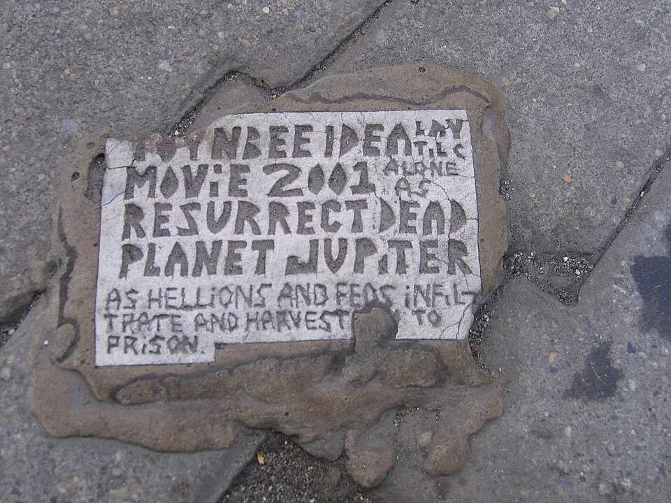Arnold J. Toynbee - Toynbee tile at the intersection of Broad Street and Chestnut Street in Philadelphia, Pennsylvania.  Photographed 07-22-2007 by en:User:Spikebrennan

en:Category:Images of Philadel