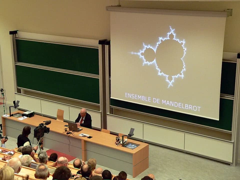 Benoit Mandelbrot - Benoît Mandelbrot during his speech at the ceremony when he was made an officer of the Legion of Honour on September 11, 2006, at the École Polytechnique; here, with a display of t
