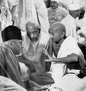 Sardar Vallabhbhai Patel - Gandhi in conference with President Maulana Azad and Sardar Patel,

A.I.C.C., Bombay, September 1940