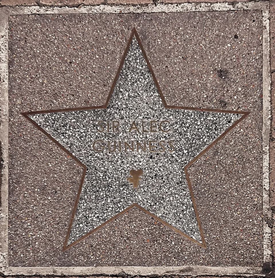 Alec Guinness - A commemorative five-pointed star set in the pavement in the forecourt of Elstree &amp; Borehamwood railway station, in honour of Sir Alec Guinness.