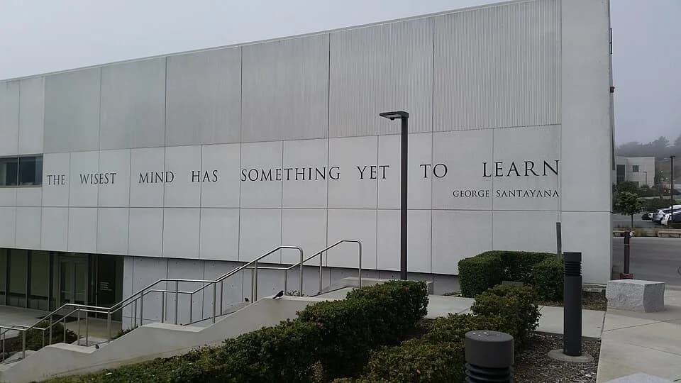 George Santayana - A buillding of the skyline collegein San Bruno with the famous quote by George Santaya "The Wisest min has something yet t learn".