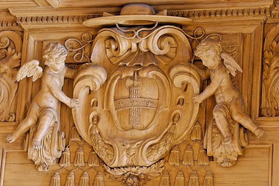 Cardinal Mazarin - Wood relief with the coat of arms of Cardinal Mazarin. Lintel of the doors of the Reading Room, the Bibliothèque Mazarine, Paris.