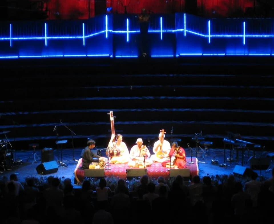Ram Narayan - Ram Narayan playing the sarangi (centre) and his daughter Aruna Narayan, also playing the sarangi (right)