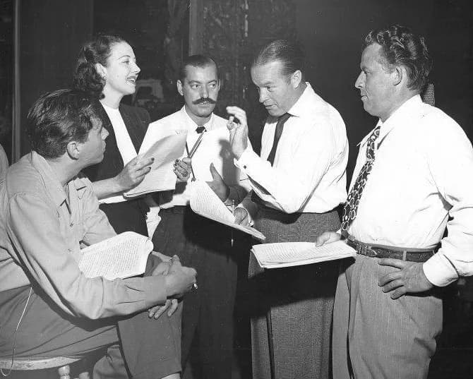 Bob Hope - Photo of Bob Hope, Jerry Colonna, Dezi Arnaz, Sr., Frances Langford and unidentified man.  The photo appears to be a rehearsal for Bob Hope's NBC Radio program.  Woman is Vera Vague [1] and
