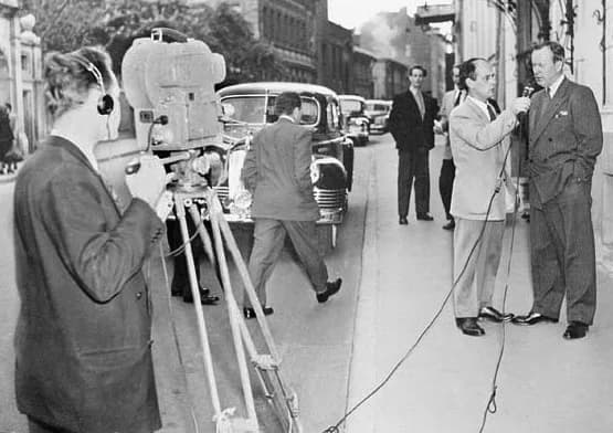 Lester B. Pearson - René Lévesque, Radio-Canada reporter, interviewing Lester B. Pearson, Canada's minister of External Affairs, outside the Canadian embassy in Moscow in October, 1955