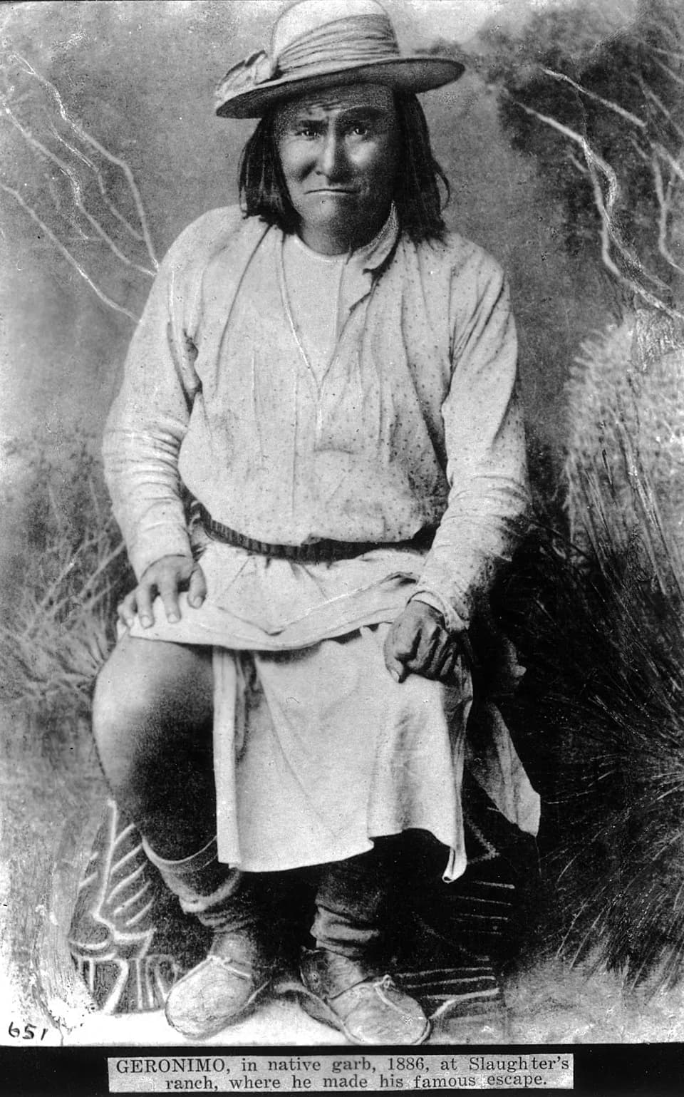 Gerónimo Gerónimo - Studio portrait (sitting) of Geronimo, a Native American (Chiricahua Apache) man. He wears moccasin boots, a breechcloth, ammunition belt, and wide-brimmed hat.