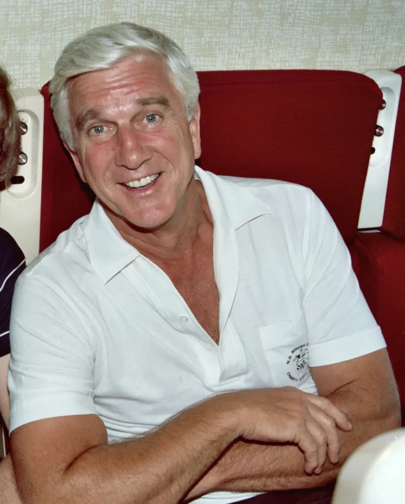 Leslie Nielsen - Actor Leslie Nielsen 1982 in a first class seat on United Airlines