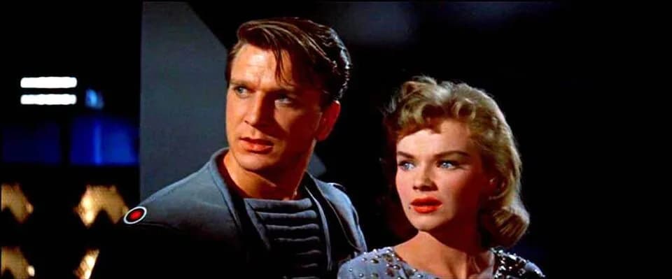 Leslie Nielsen - Screenshot of Leslie Nielsen and en:Anne Francis from the trailer of the motion picture Forbidden Planet.