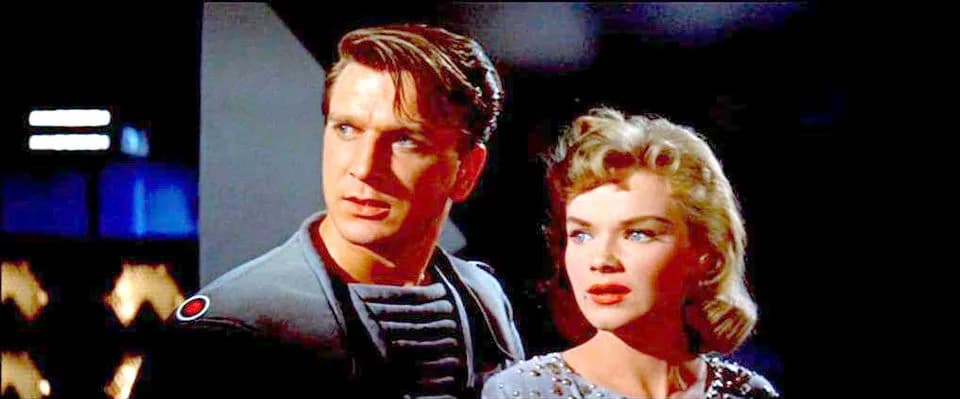 Leslie Nielsen - Screenshot of Leslie Nielsen and Anne Francis from the trailer for the film Forbidden Planet.