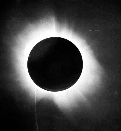 Arthur Eddington - Caption:  
From the report of Sir Arthur Eddington on the expedition to verify Albert Einstein's prediction of the bending of light around the sun.
In Plate 1 is given a half-tone r