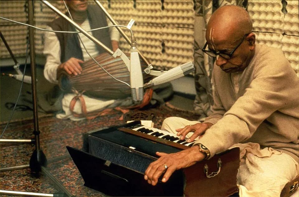 A. C. Bhaktivedanta Swami Prabhupada - Bhaktivedanta Swami Prabhupada playing harmonium during recording session of "Krishna Meditations" album