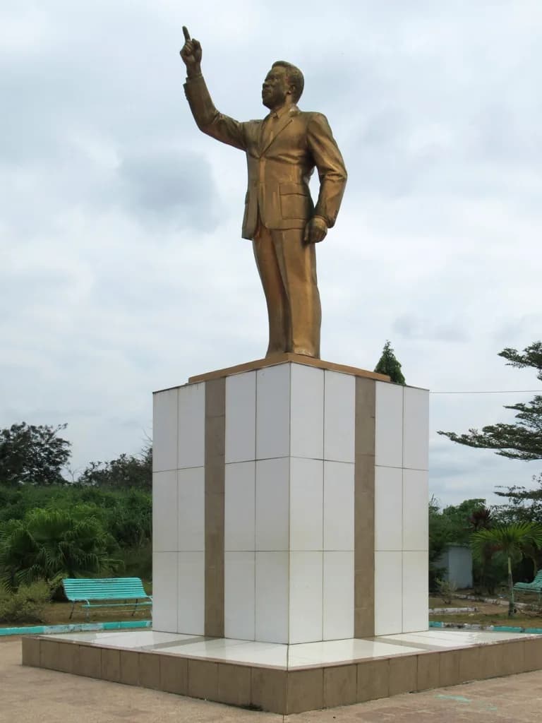 Omar Bongo - A golden statue of the late President Omar Bongo (1936-2009) overlooks Place de l'Independence in Franceville, Gabon, Central Africa. Omar Bongo was born and is buried in Franceville and 
