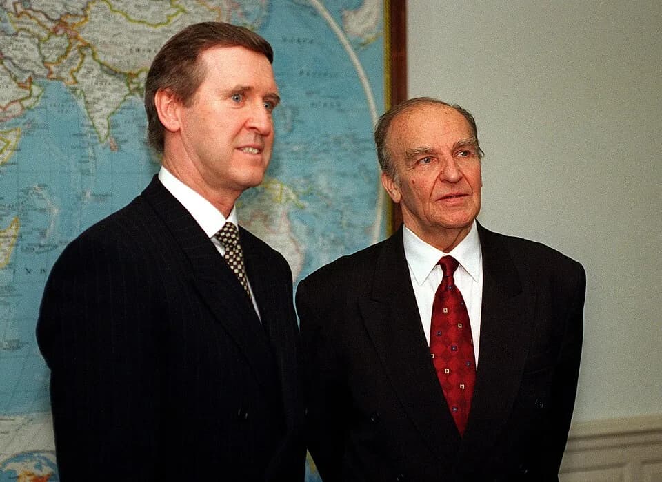 Alija Izetbegović - Secretary of Defense William S. Cohen (left), and President Alija Izetbegovic (right), of the Republic of Bosnia and Herzegovina, listen to a reporter's question during a media ava