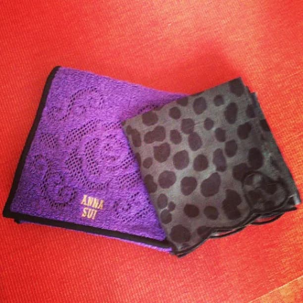 Yves Saint Laurent - An Anna Sui mini-towel (left) and a YSL handkerchief purchased in Japan, 2013, to cope with the heat.