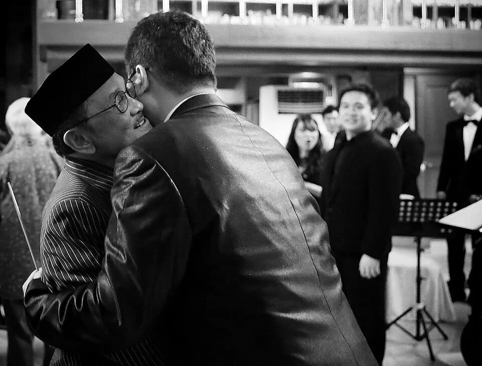 B. J. Habibie - He seems happy with his second musical commission, my Chamber Symphony no. 1. His first commission ever was to composer Yazeed Djamin who wrote the "Variations on Sepasang Mata Bola" f