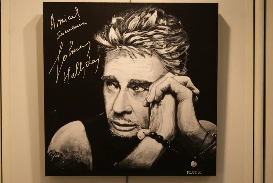 Johnny Hallyday - Portrait réalisé lors de sa venue au Zénith de Strasbourg, dédicacé par le chanteur lui même le soir du concert.
Artiste : Jean-Christophe MATZ