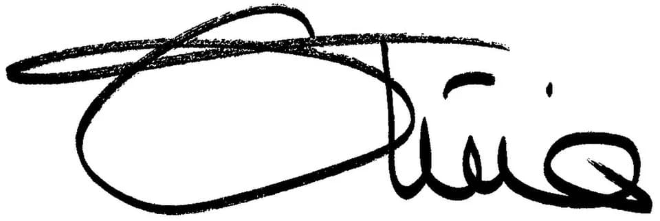 Olivia Newton-John - Olivia Newton-John's signature in a copy of her book Don't Stop Believing, cropped from an image of this inscribed page: