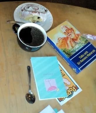 Ramana Maharshi - A copy of "Talks with Sri Ramana Maharshi" at the Flying M Coffee House in Boise, Idaho, United States in late March 2011, the occasion being a quinquagenarial birthday celebration.