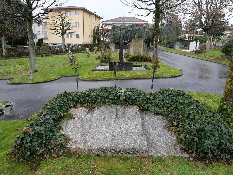 Jean Anouilh - The grave of French playwright and dramatist Jean Anouilh (1910-1987), his daughter Catherine (1934-1989) and his last partner Ursula Wetzel (1938-2010) at the cemetery of Pully in the