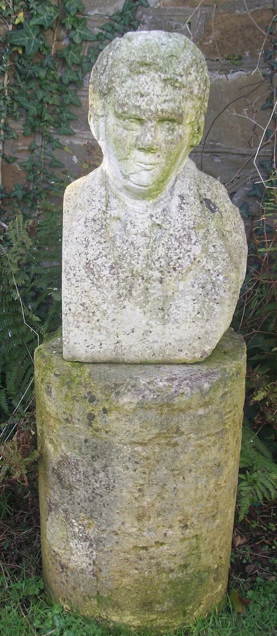 Dylan Thomas - Hand-carved bust of the Welsh poet Dylan Thomas, Swansea Museum garden by R.D. Innes ,2006