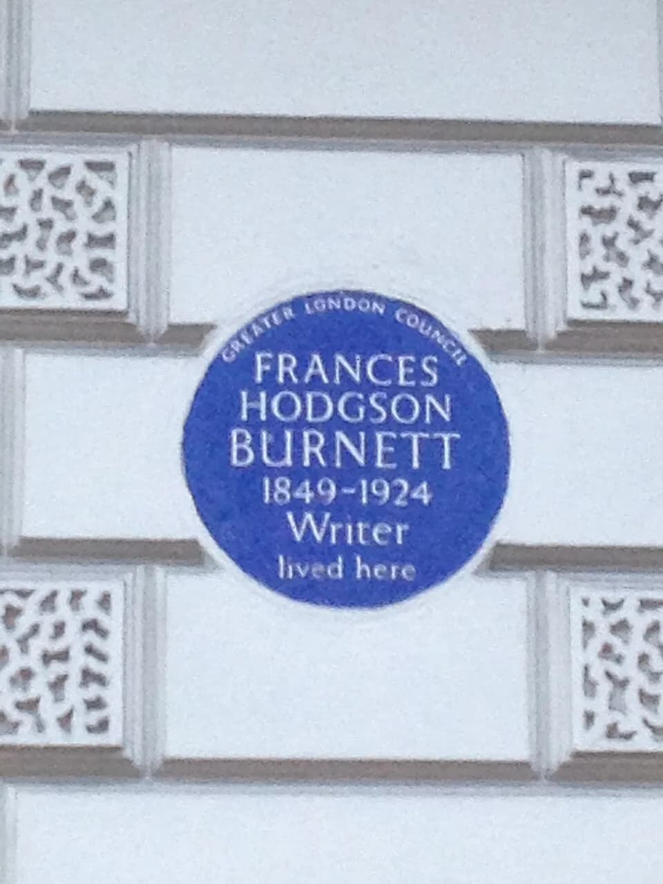 Frances Hodgson Burnett - The Greater London Council blue plaque for Frances Hodgson Burnett at 63 Portland Place, Marylebone, W1B 1QP in the City of Westminster.