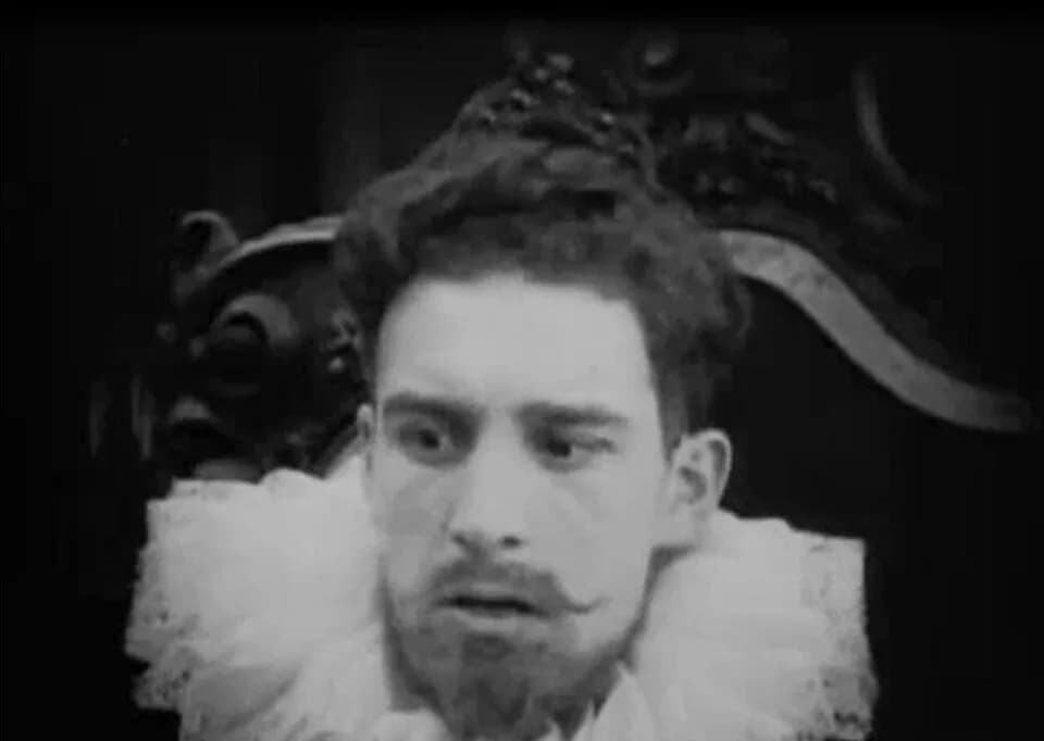Charles IX of France - Low resolution screenshot from the public domain version of the film Intolerance (1916). A scene from the French story of the film. King Charles IX (Frank Bennett) is dismayed w