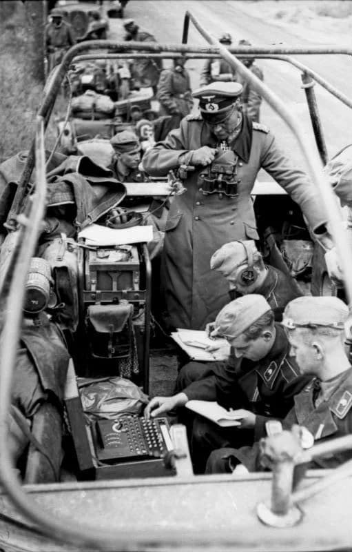 Heinz Guderian - General Heinz Guderian in a Sd.Kfz. 251/6 Ausf. A armoured command vehicle,  (m.Kommandopanzerwagen), with Enigma machine, France, May 1940. NB! The original archive caption "SdKfz.25