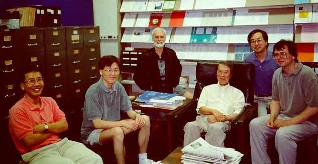 Yoichiro Nambu - Nambu and associates at the Argonne Non-Abelian Duality Theory Institute, July 1996.  From left to right, SK Nam, P Yi, TL Curtright, Y Nambu, T Uematsu, and A Jevicki.