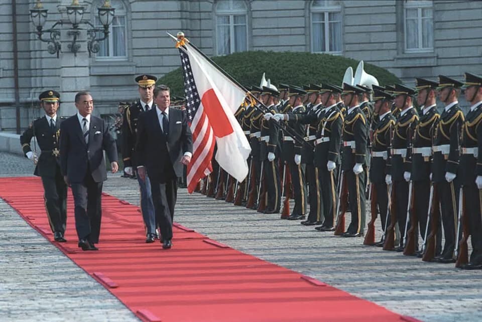 Yasuhiro Nakasone - Nakasone and President Reagan reviewing troops at an Arrival Ceremony at Palace in Tokyo, Japan May 4, 1986.