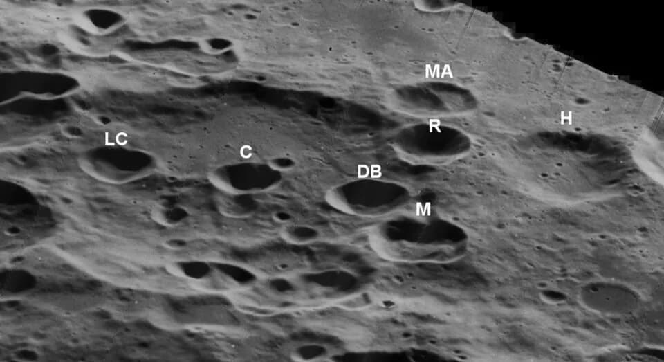 Kalpana Chawla - Oblique view of a cluster of lunar craters within the larger Apollo, on the far side of the moon, facing west.  The craters are named after the seven astronauts killed in the Space Sh