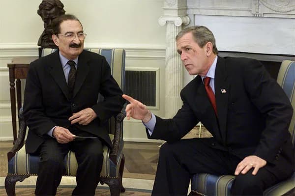 Bülent Ecevit - President George W. Bush and Prime Minister Bulent Ecevit of the Republic of Turkey talk with reporters in the Oval Office Wednesday, Jan. 16. Photo: Paul Morse, White House.