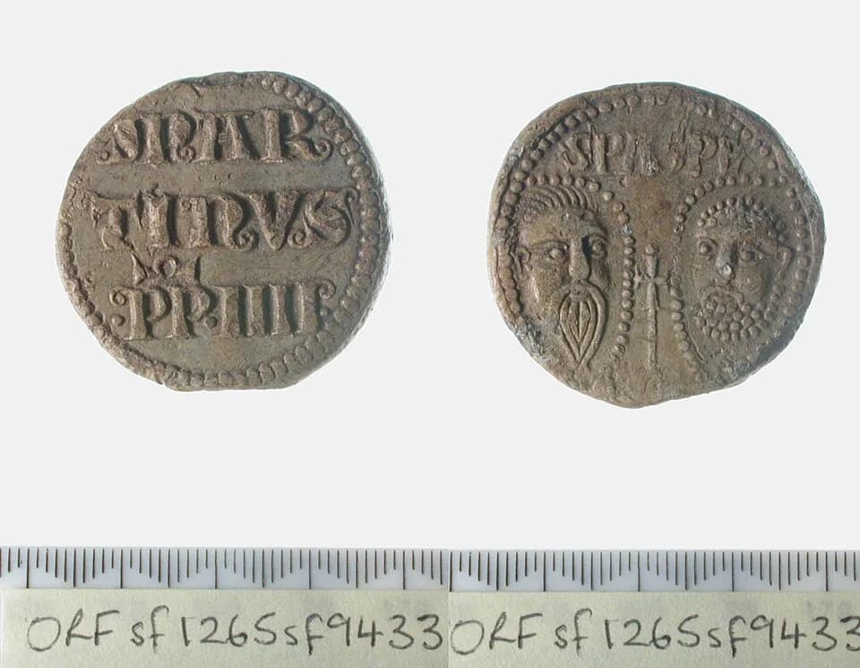 Martin IV - A lead seal, or bulla, from a papal document, in very good condition. It is flat and circular in shape with a diameter of 37mm and is 5mm thick. The inscription on the reverse of this bull