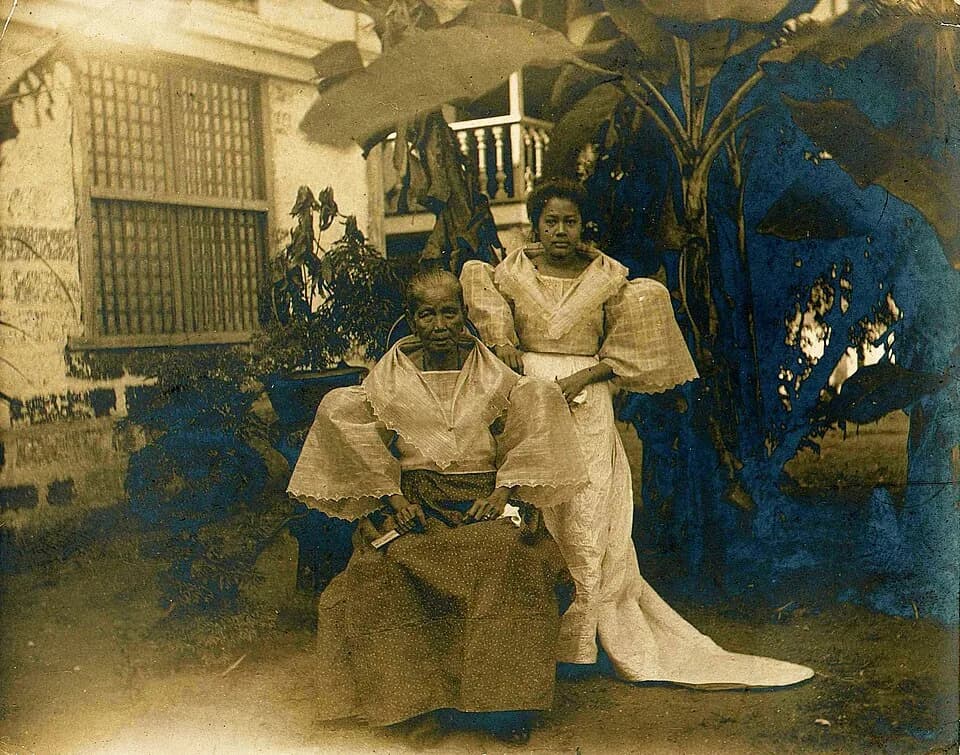 Emilio Aguinaldo - Emilio Aguinaldo's mother and niece in 1930 in front of his home in Cavite Viejo.