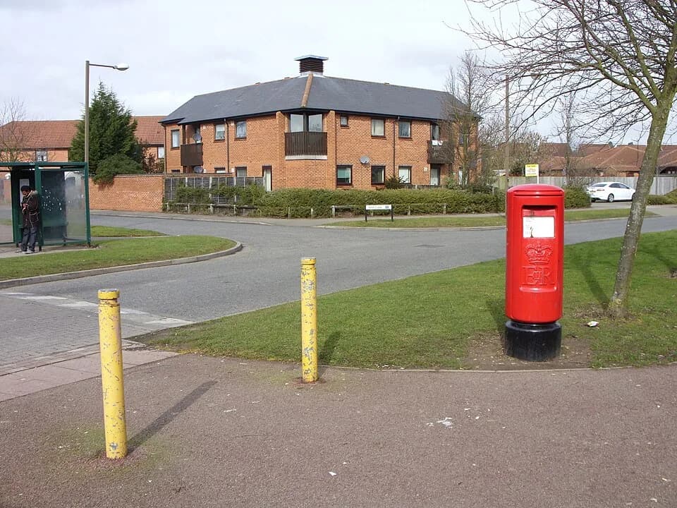 Benjamin Britten - Britten Grove Postbox and bus shelter Close to the junction with Arne Lane the Old Farm Park postbox is positioned where a footpath joins the road from the east.