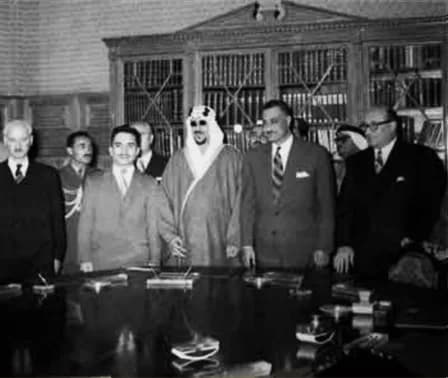 Saud of Saudi Arabia - The signing of the Arab Defense Pact between Egypt, Saudi Arabia, Syria and Jordan in Cairo, Egypt. From left to right at the forefront: Jordanian Prime Minister Sulayman al-Nab