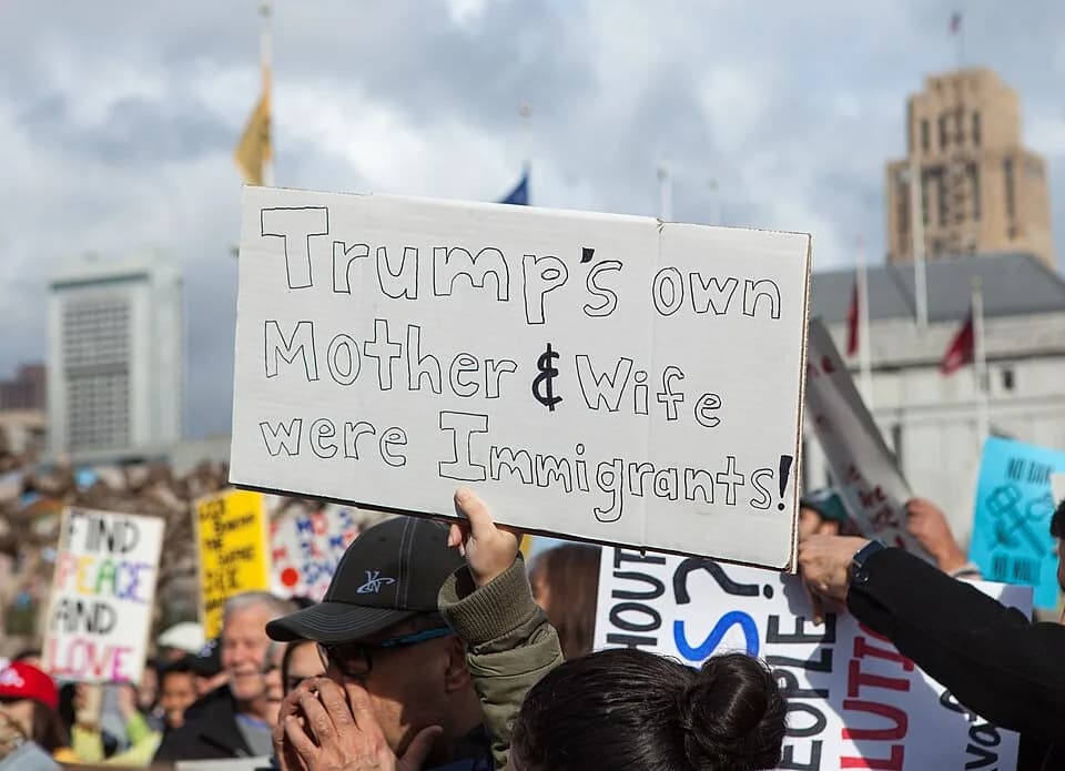 Ivana Trump - A San Francisco protester of the U.S. immigration ban holds a sign reading "Trump's own Mother and Wife were Immigrants!"