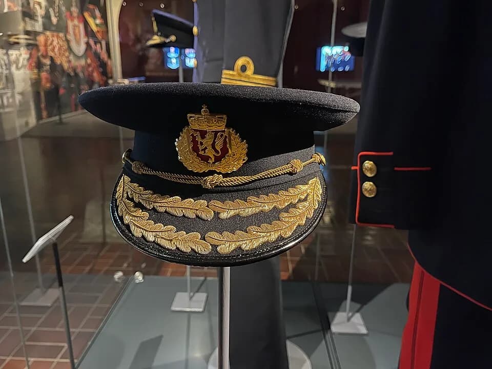 Olav V of Norway - Photo taken at an exhibition in the Armed Forces Museum of Norway (Forsvarsmuseet) in Oslo, Norway:
Military full dress uniforms without ceremonial accessories worn by Norwegian roy