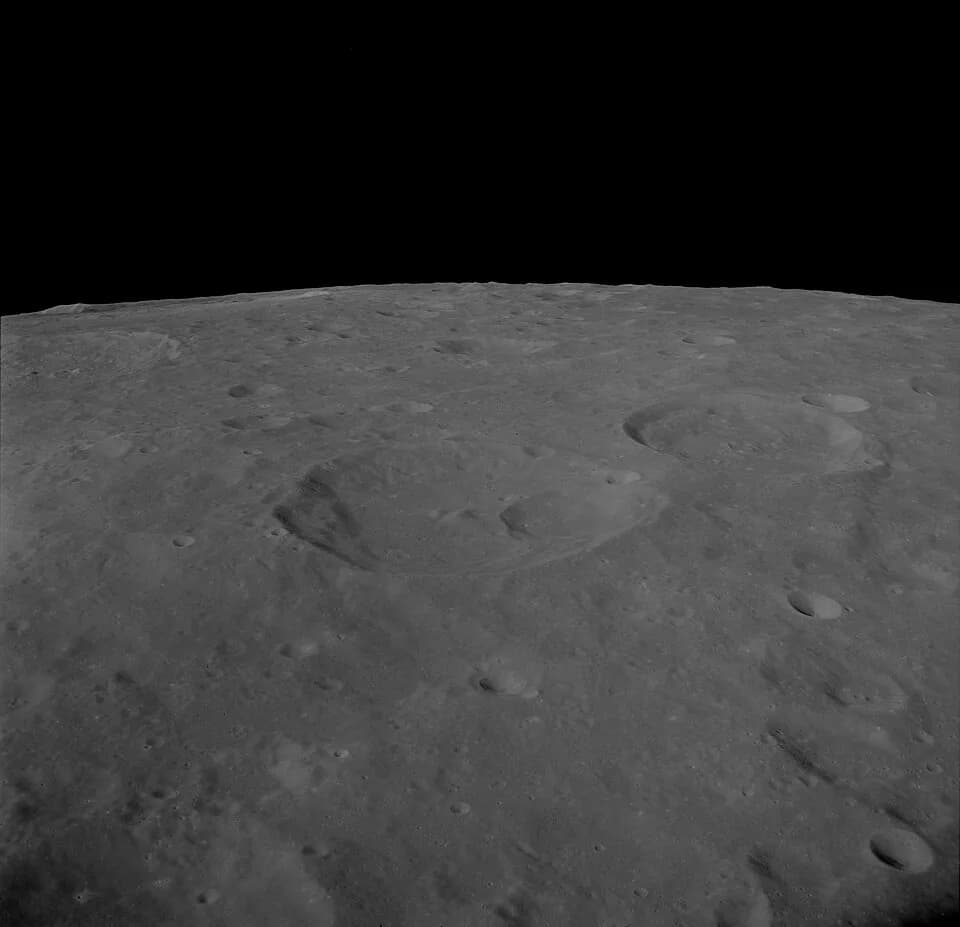 Arne Tiselius - Oblique view of Valier, on the far side of the moon.